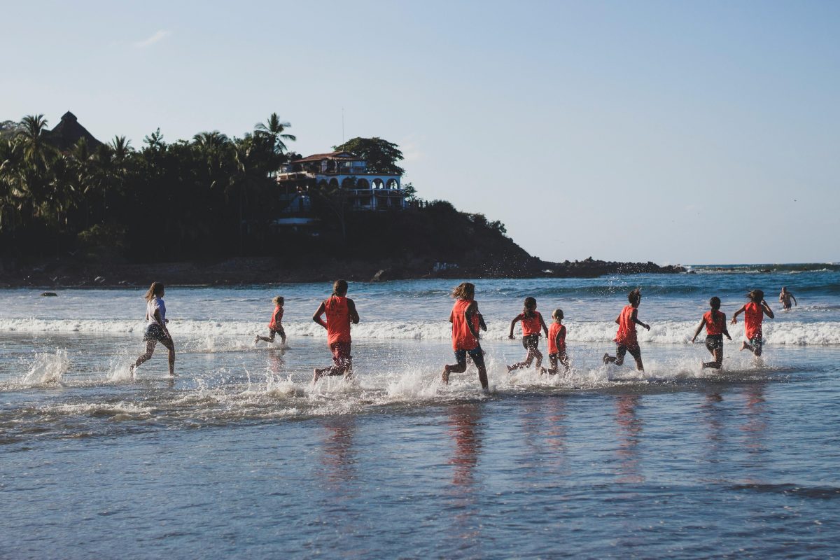 People running on seashore during training